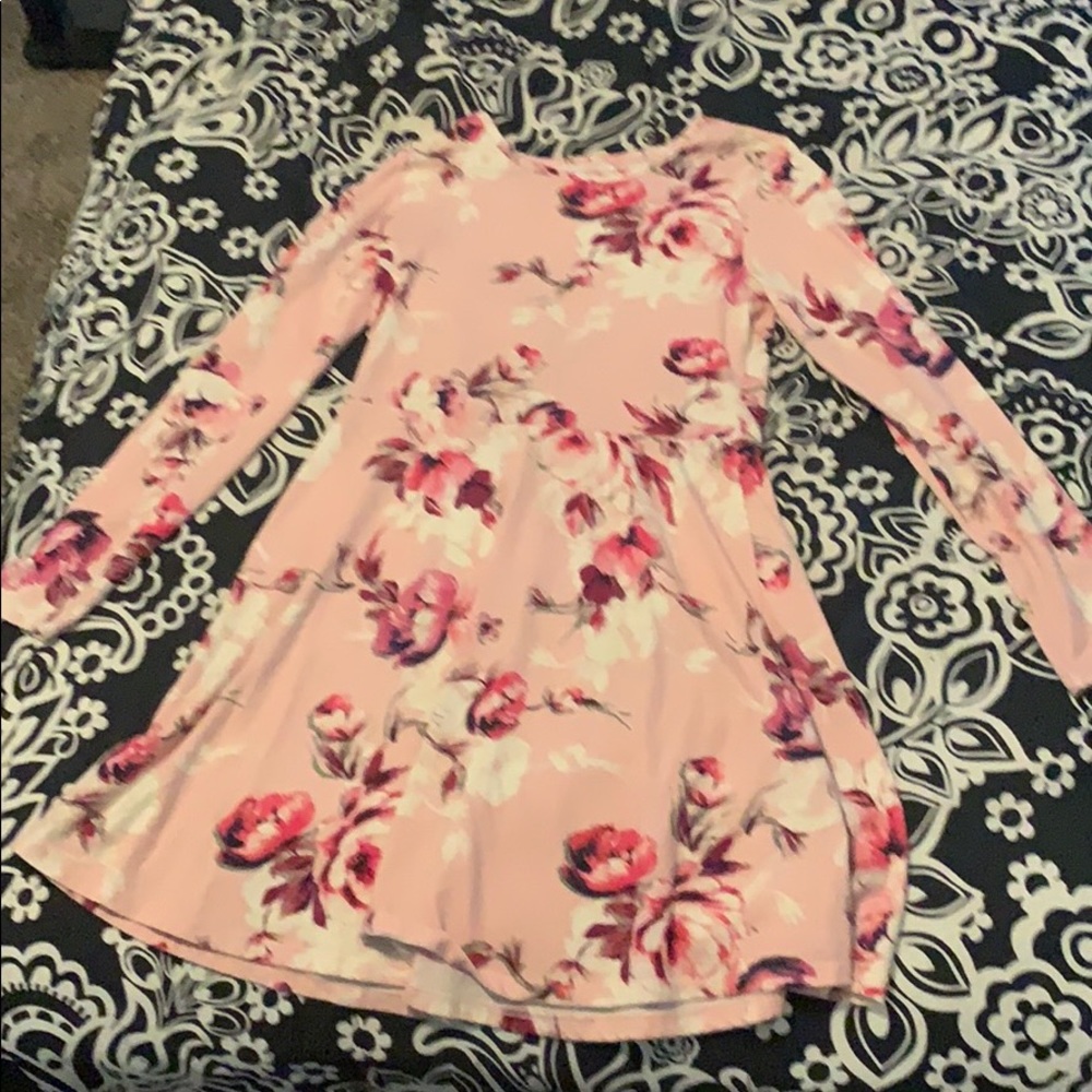 A long sleeve dress. That is pink.
